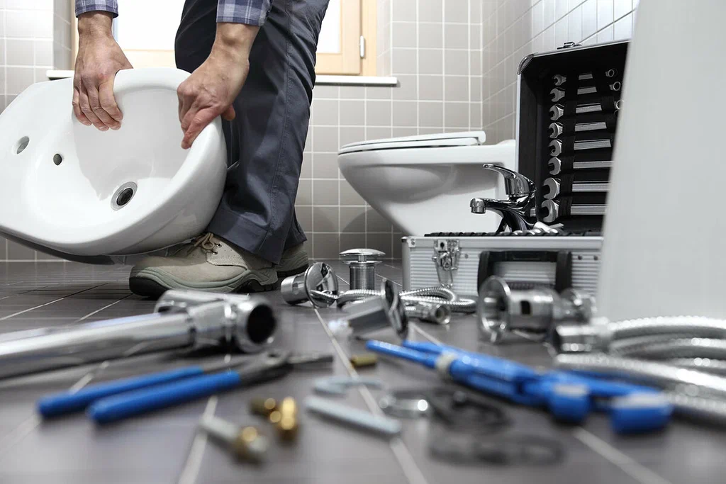 Plumbing tools prepared for a bathroom repair in Red Oak